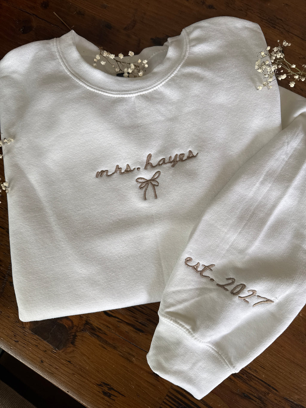 Custom embroidered Mrs. crewneck with wedding year on sleeve