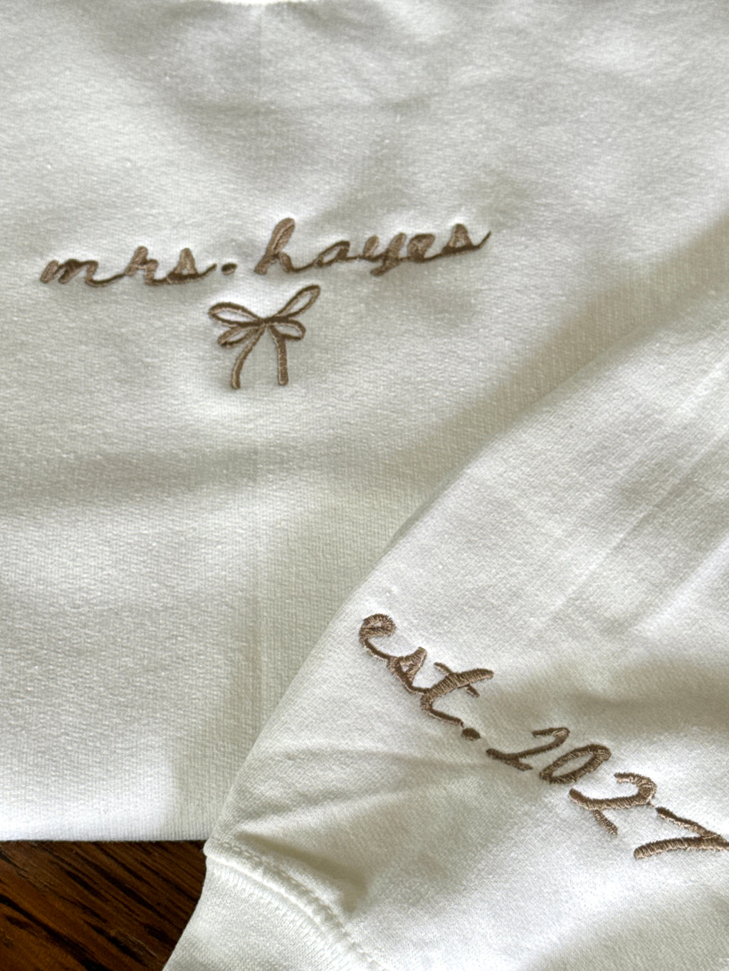 Custom embroidered Mrs. crewneck with wedding year on sleeve