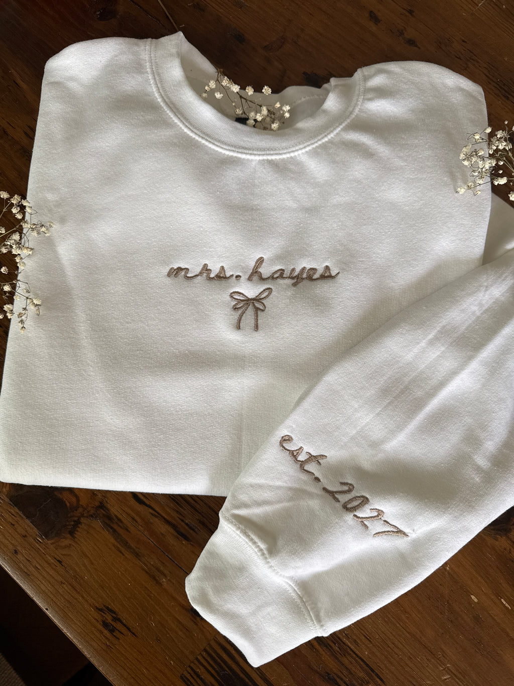 Custom embroidered Mrs. crewneck with wedding year on sleeve
